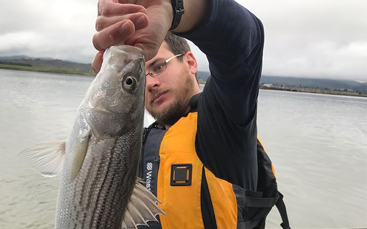 man holding a fish